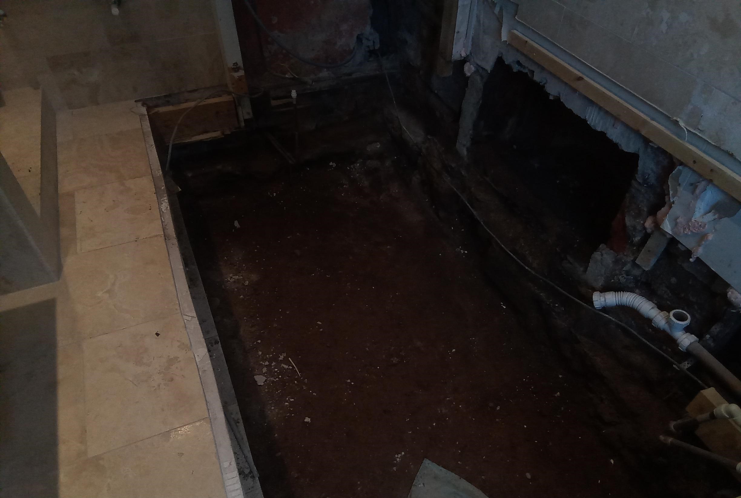 The policyholders bathroom floor is dug out, with contaminated material removed or treated in situ as appropriate by CTSL Spill Specialists