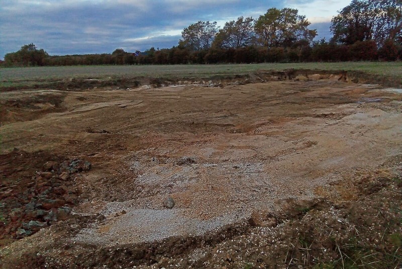 Mid-way through clean-up and restoration of the policyholder’s farm field following a fuel spill, replacing contaminated material with clean soils